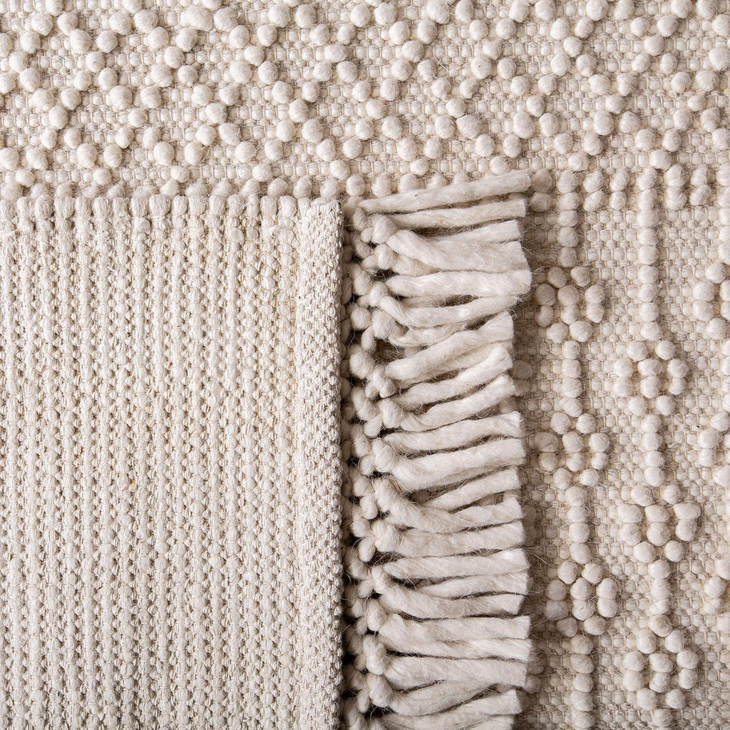 SAFAVIEH Natura Collection Accent Rug - 4' x 6', Ivory, Handmade Moroccan Boho Wool Fringe, Ideal for High Traffic Areas in Entryway, Living Room, Bedroom (NAT852B)